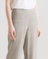 Liberty Print Silk Palazzo Trousers, Ocher Green Geo | Really Wild Clothing | Model Front Close Up